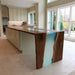 Handcrafted black walnut table with aqua resin river in living room