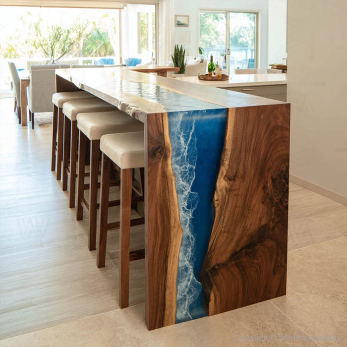 Contemporary ocean wave epoxy dining table displayed as centerpiece