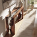Close-up of black walnut wood grain and transparent epoxy waterfall detailing