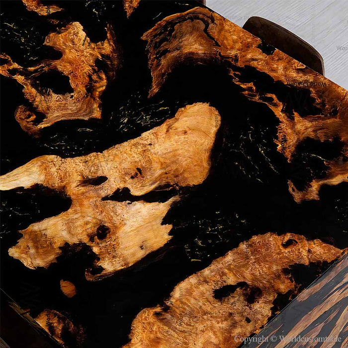 Close up of burl wood grain and black resin epoxy waterfall table