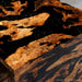 Epoxy waterfall table with black resin used in a modern office