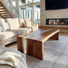 Handcrafted white resin epoxy coffee table next to modern sofa