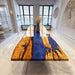Handcrafted live edge olive wood blue epoxy river dining table with glossy finish, custom resin table made in California.
