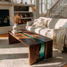 Blue-green resin coffee table with waterfall design on wooden slab