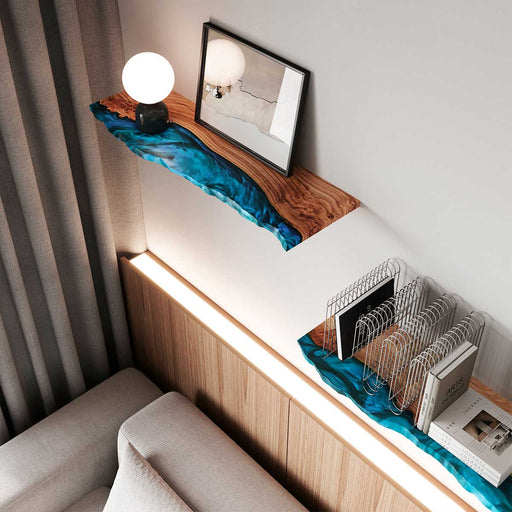 Rectangular walnut wood live edge shelf with a blue resin river and modern storage design