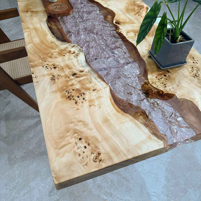 Extreme close-up capturing the clarity of the ultra-transparent resin and the natural texture of the poplar wood edge.