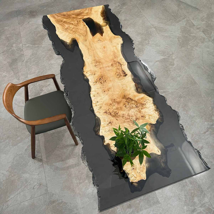 S72 translucent black epoxy live edge poplar coffee table styled in a modern room, highlighting its 8-person 87” x 33” size.