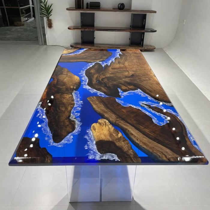 Ocean blue epoxy dining table handcrafted with natural Black Walnut and organic wood edges