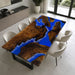 Close up of ocean blue epoxy and white wave details along natural Black Walnut edges