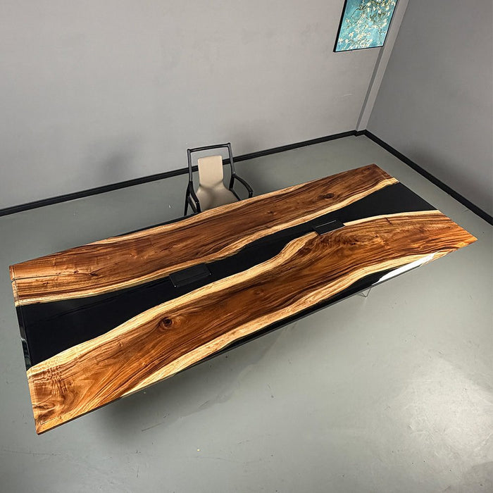 Modern walnut conference table with two integrated power outlets for meeting rooms
