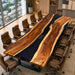 Live edge walnut and black epoxy boardroom table with natural wood grain