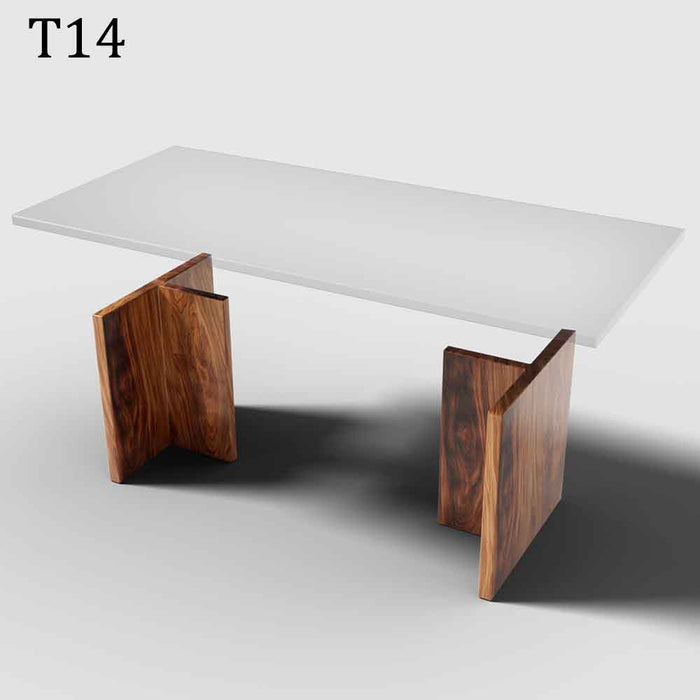 Modern table with wooden legs and a white top on a gray background
