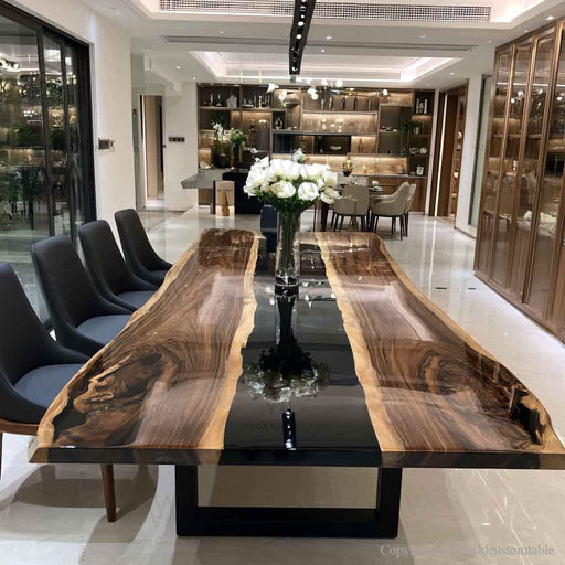 Modern epoxy river table combining natural walnut wood texture with a deep black resin river for a sophisticated luxury furniture design.