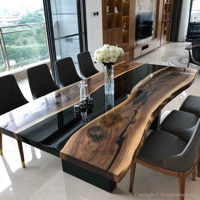 Handcrafted custom live edge epoxy table made with black walnut slabs and black resin, showcasing premium woodworking craftsmanship.