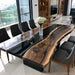 Handcrafted custom live edge epoxy table made with black walnut slabs and black resin, showcasing premium woodworking craftsmanship.