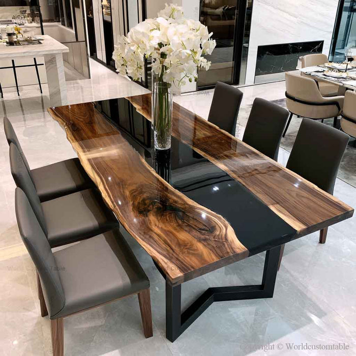 High-end solid walnut resin dining table designed for elegant homes, featuring a smooth epoxy surface and unique natural wood character.