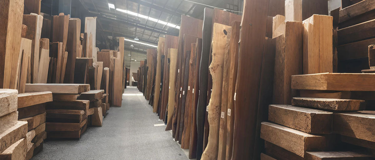 Stacks of wooden planks in a warehouse setting