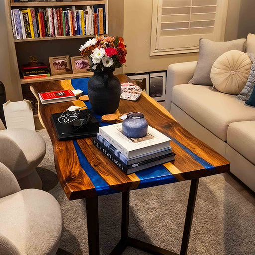Wooden coffee table with decorative items in a living room setting