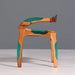 Wooden chair with green accents on a gray background