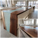 Artisan black walnut aqua epoxy table styled in luxury interior decor