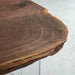 Artisan crafted black walnut table featuring irregular edges and smooth finish