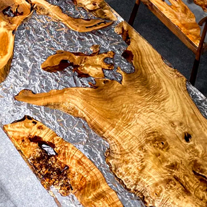 Wooden slabs with natural grain and edge on a gray surface