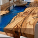 Wooden table with blue resin inlay