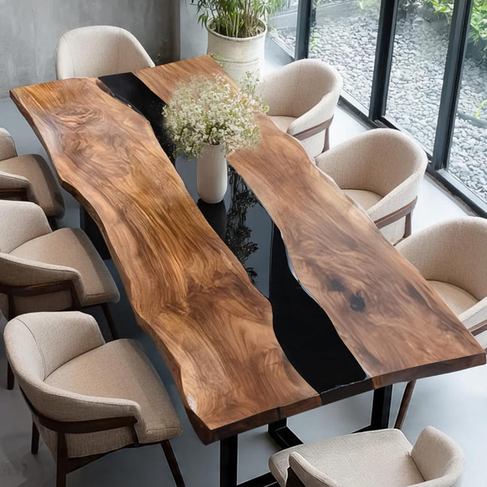 Artisan-crafted walnut table featuring a live edge design and black resin centerpiece.