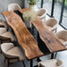 Artisan-crafted walnut table featuring a live edge design and black resin centerpiece.