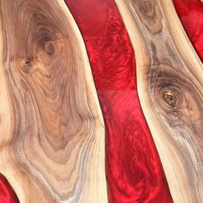 Artisan-crafted walnut and red epoxy resin table for elegant interiors