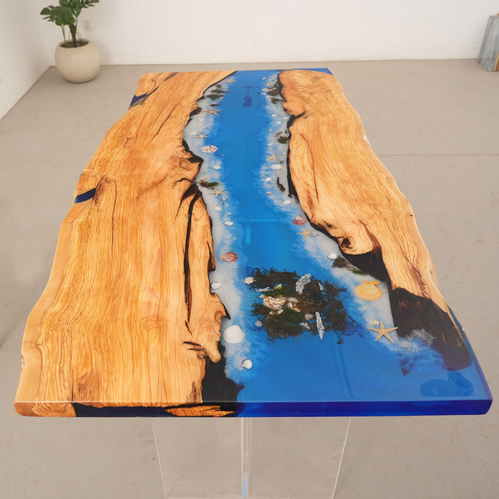 Artistic ocean wave resin table combining natural olive wood and vivid blue epoxy