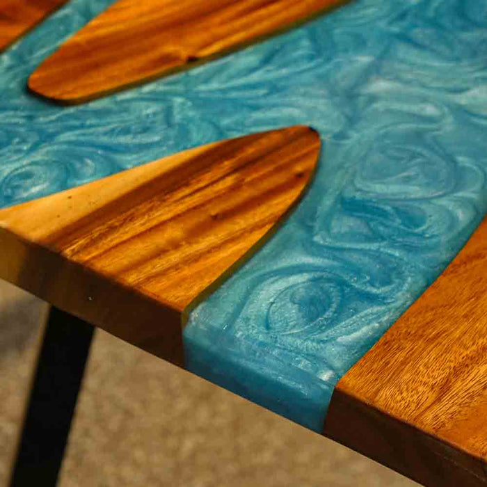 Bespoke walnut epoxy river dining table crafted for custom spaces