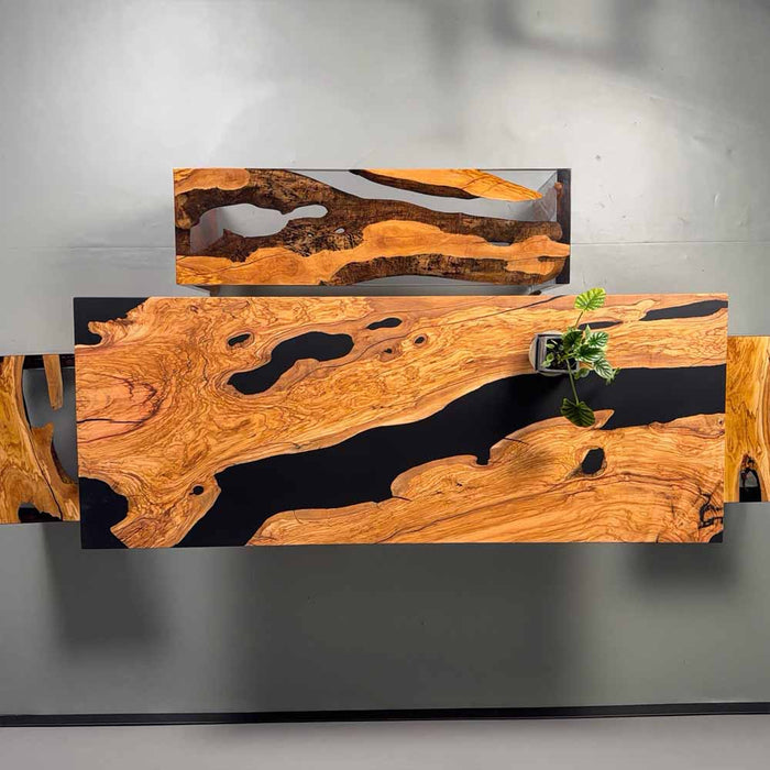 Wooden table with black resin inlay on a gray background