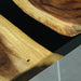 Close-up of a wooden surface with a black border