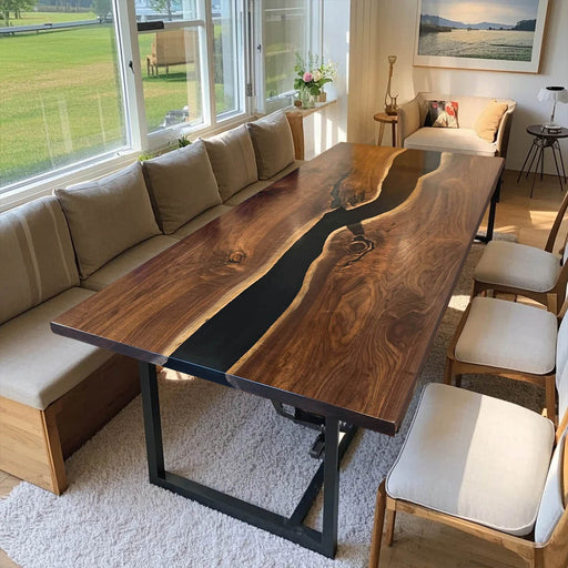 Large walnut dining table with live edge and black epoxy river