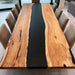 80x42 black resin epoxy dining table in open kitchen luxury home interior