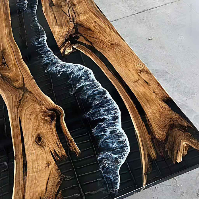 Wooden table with blue resin inlay on a concrete floor