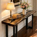 black walnut console table featuring bold black epoxy resin
