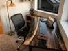 Luxury Black Walnut and Black Epoxy Resin River Office Desk with laptop.