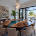 Round black walnut blue epoxy dining table in modern dining room