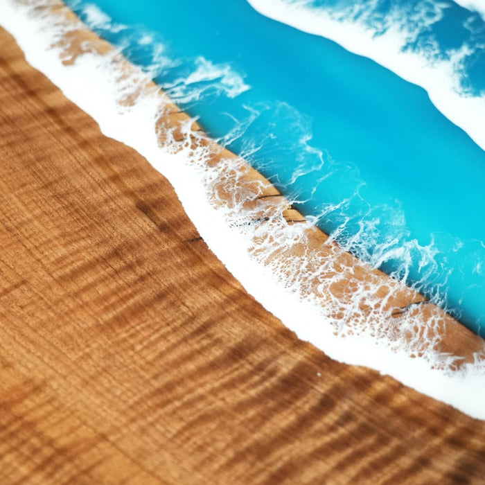 Black walnut coastal resin dining table with handcrafted epoxy details