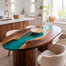 Black Walnut epoxy dining table with vibrant teal resin river