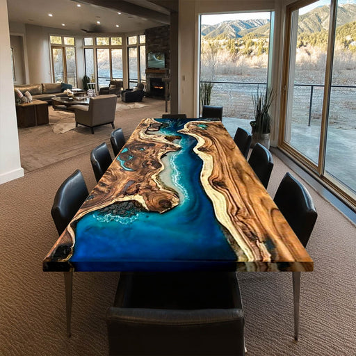 Dining room with a unique wooden table featuring a blue resin design.