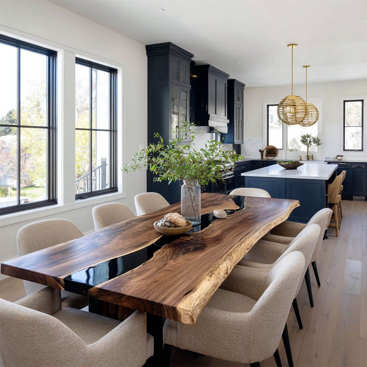 Black walnut live edge epoxy river dining table in modern dining room.