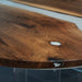 Black walnut gray epoxy dining table with handcrafted resin details