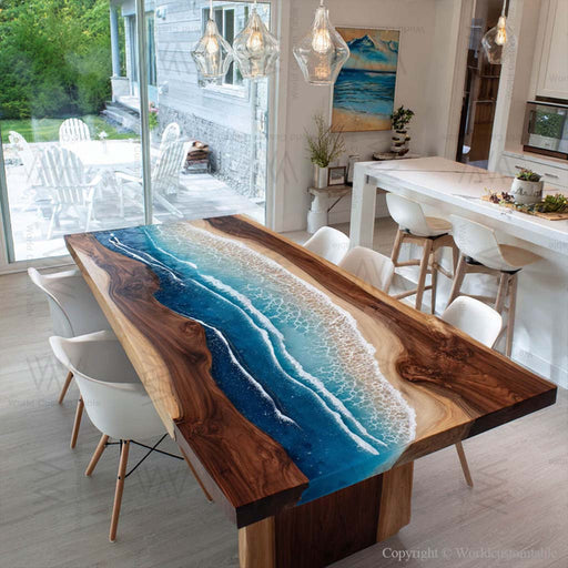 Dining room with a unique wooden table featuring an ocean design.