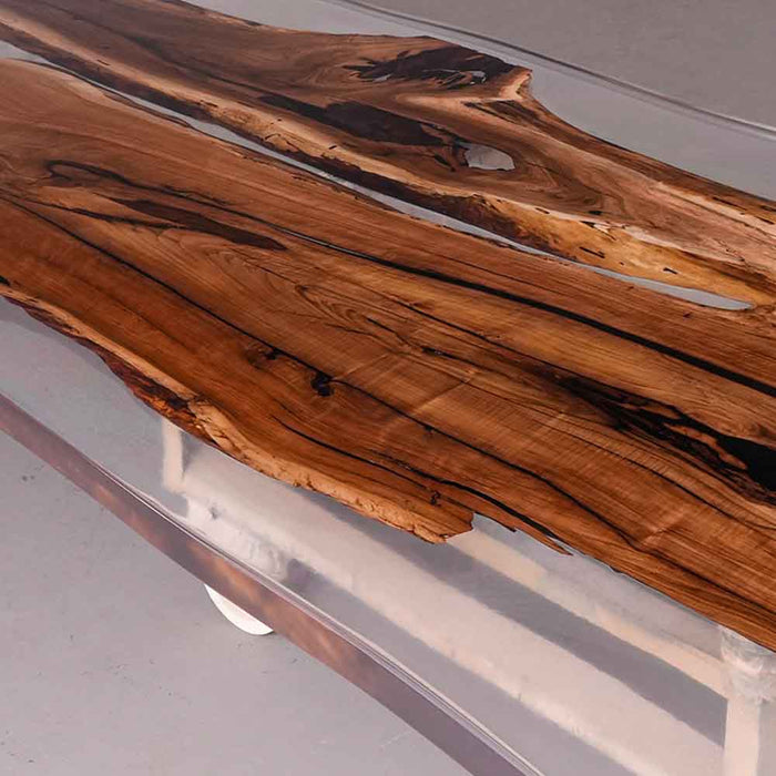 Black walnut epoxy resin conference table paired with modern office chairs and decor.