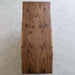 Black walnut solid wood dining table handcrafted to highlight deep wood tones and texture
