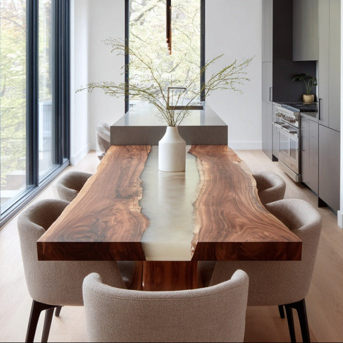 Modern dining area with a wooden table and chairs in a well-lit room.
