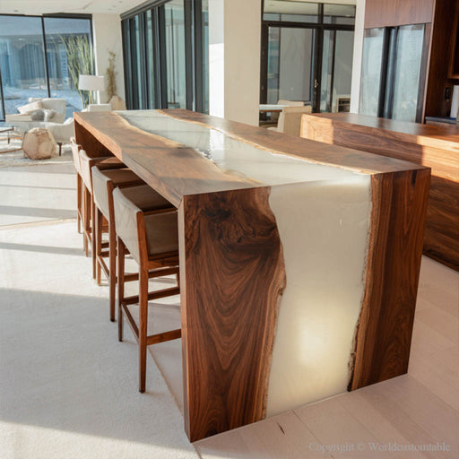 Black walnut white epoxy waterfall table in a dining room setting